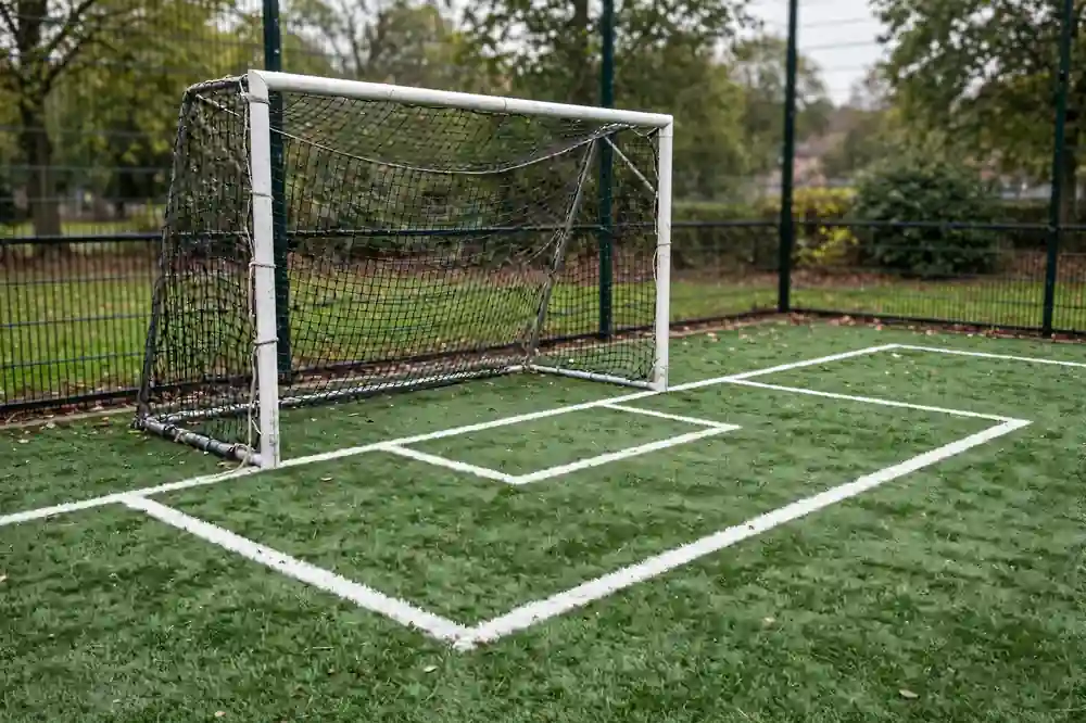 Small-sided football goal and compact penalty area