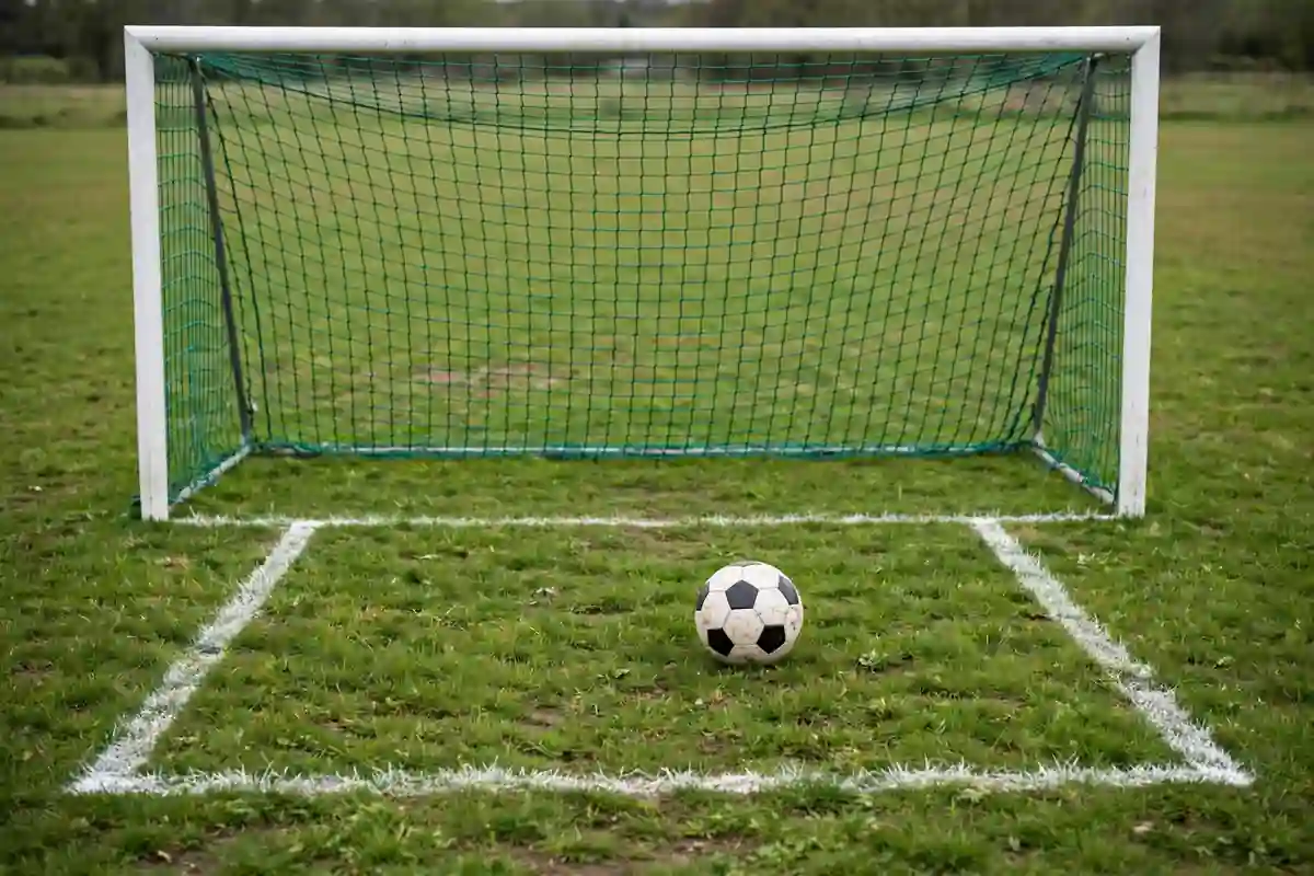 Goal area six-yard box markings with a football placed for a goal kick